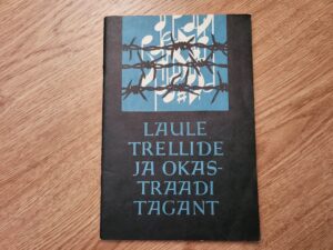 Laule trellide ja okastraadi tagant