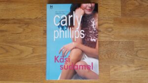 Käsi südamel . Carly Phillips