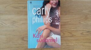 Käsi südamel . Carly Phillips