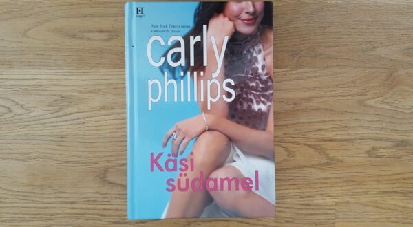 Käsi südamel . Carly Phillips