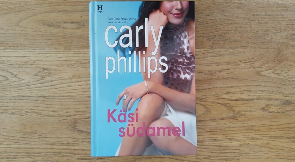 Käsi südamel . Carly Phillips