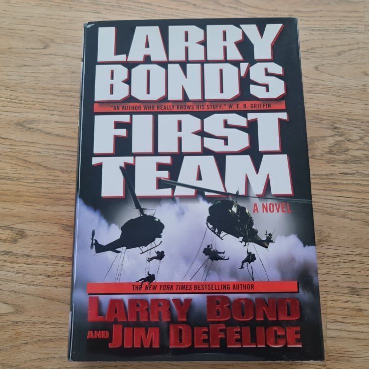 85112097 Larry Bond's First Team . Larry Bond Jim DeFelice
