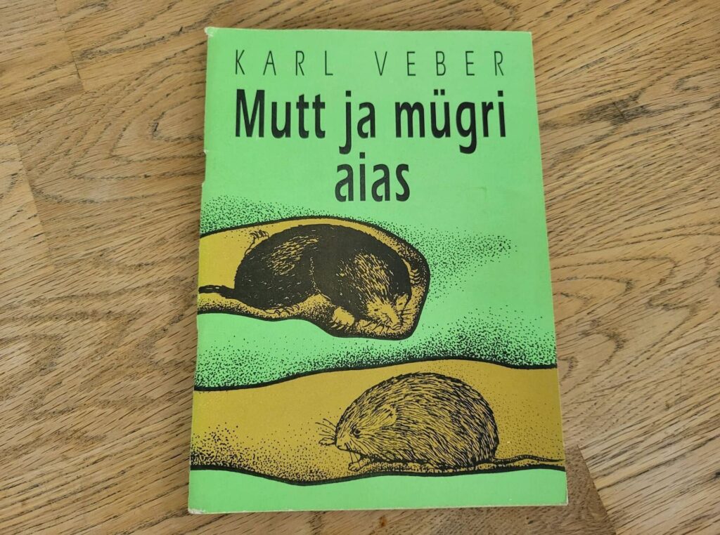 Mutt ja mügri aias . Karl Veber